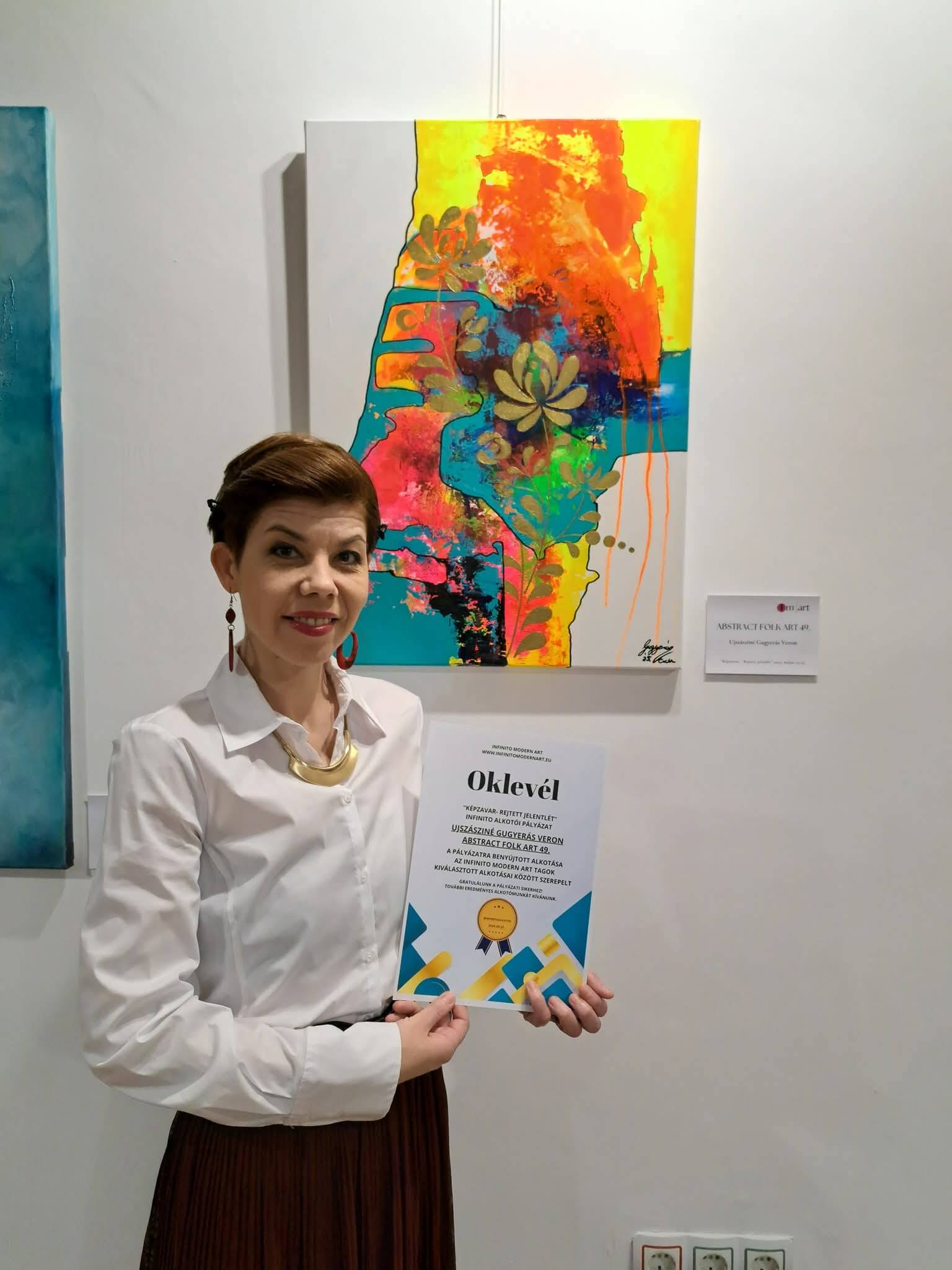 Gugyeráas Veron a festményével
